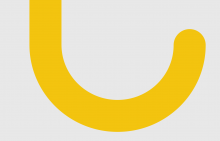 vergrößerter gelber Griff eines Regenschirms